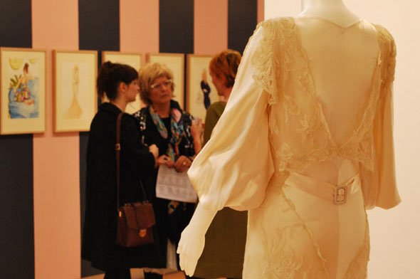  exhibition at the QUT Art Museum behind a bespoke Chanel wedding gown