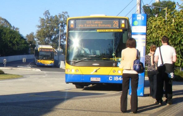 Commuters getting onto bus