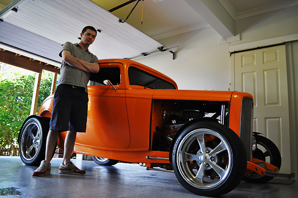 Simon Elvish stands next to his 1932 Ford Coupe