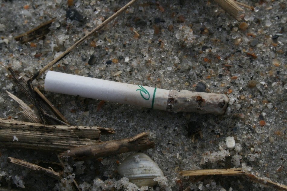 Cigarette on the ground.