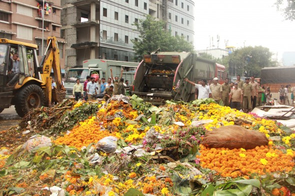 Old flowers being taken away for disposal at Dadar flower markets. By Connie Li.