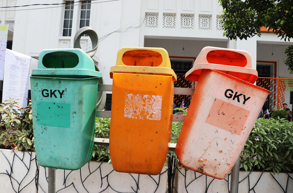 Coloured bins designed to clean up Jakarta