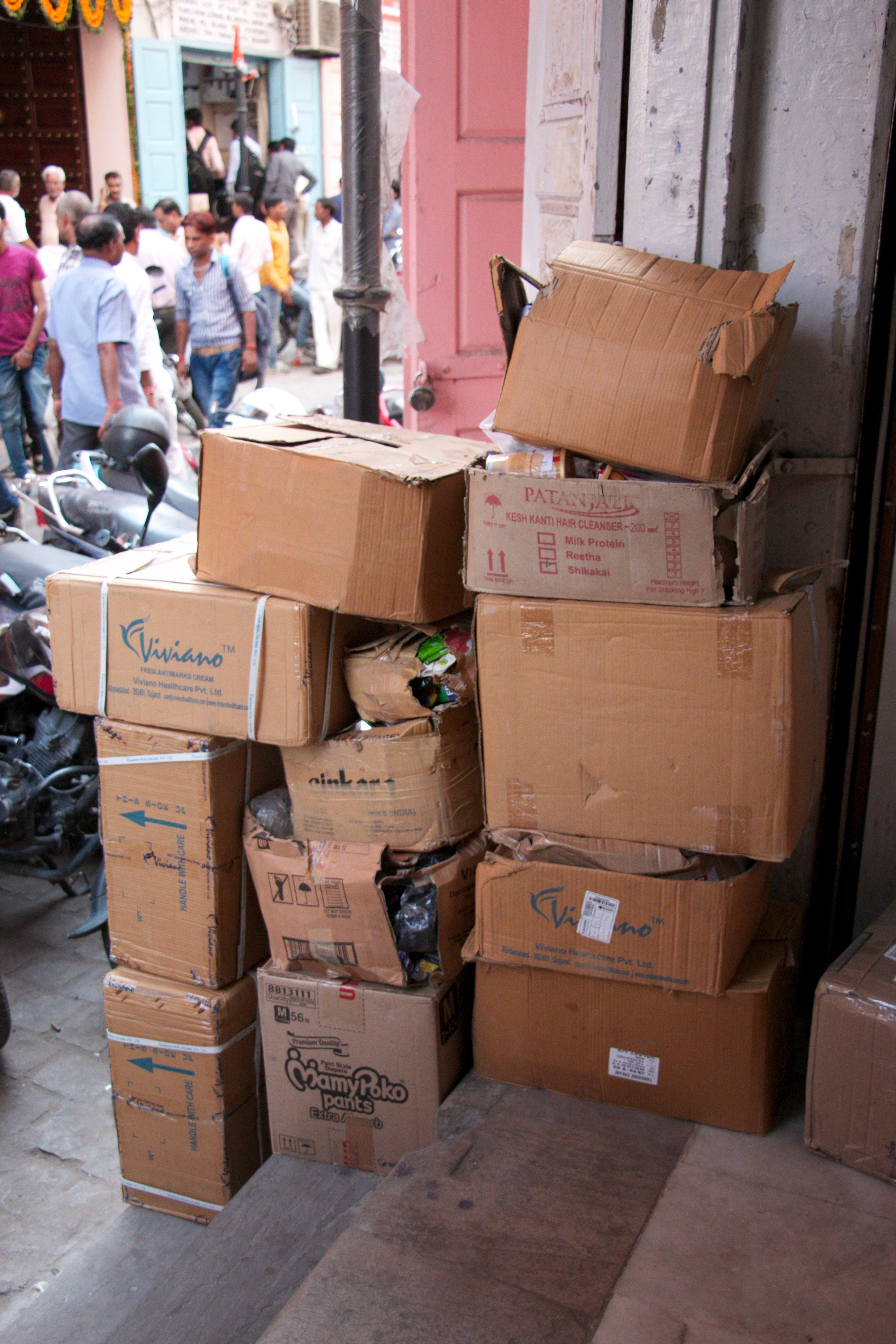 Boxes piled at the front of pharmacists.